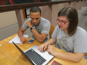 Student and tutor at Writing Center satellite